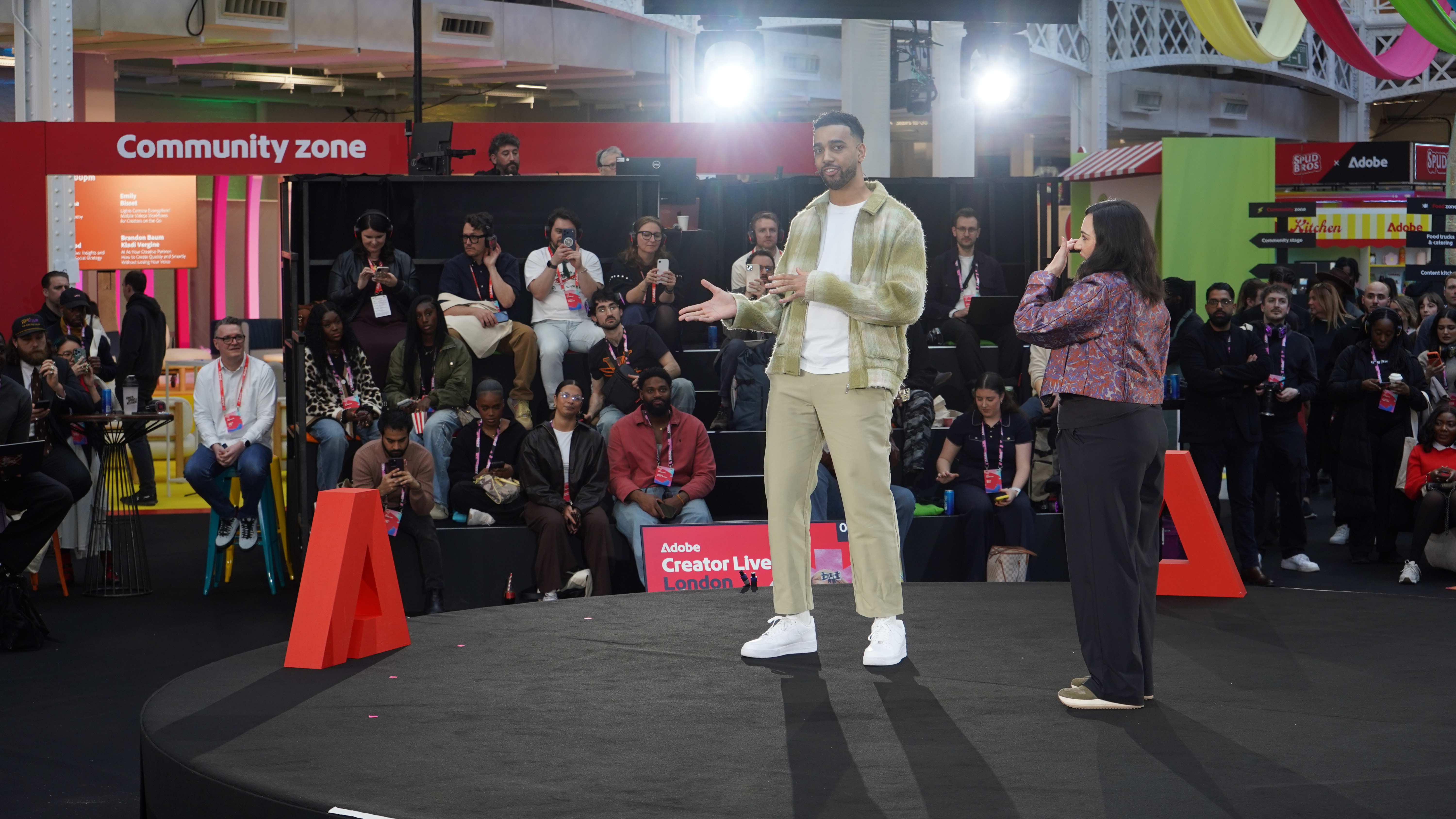 Niko Omilana introduced by Leah Walker on stage at Adobe Creator Live 2026 London