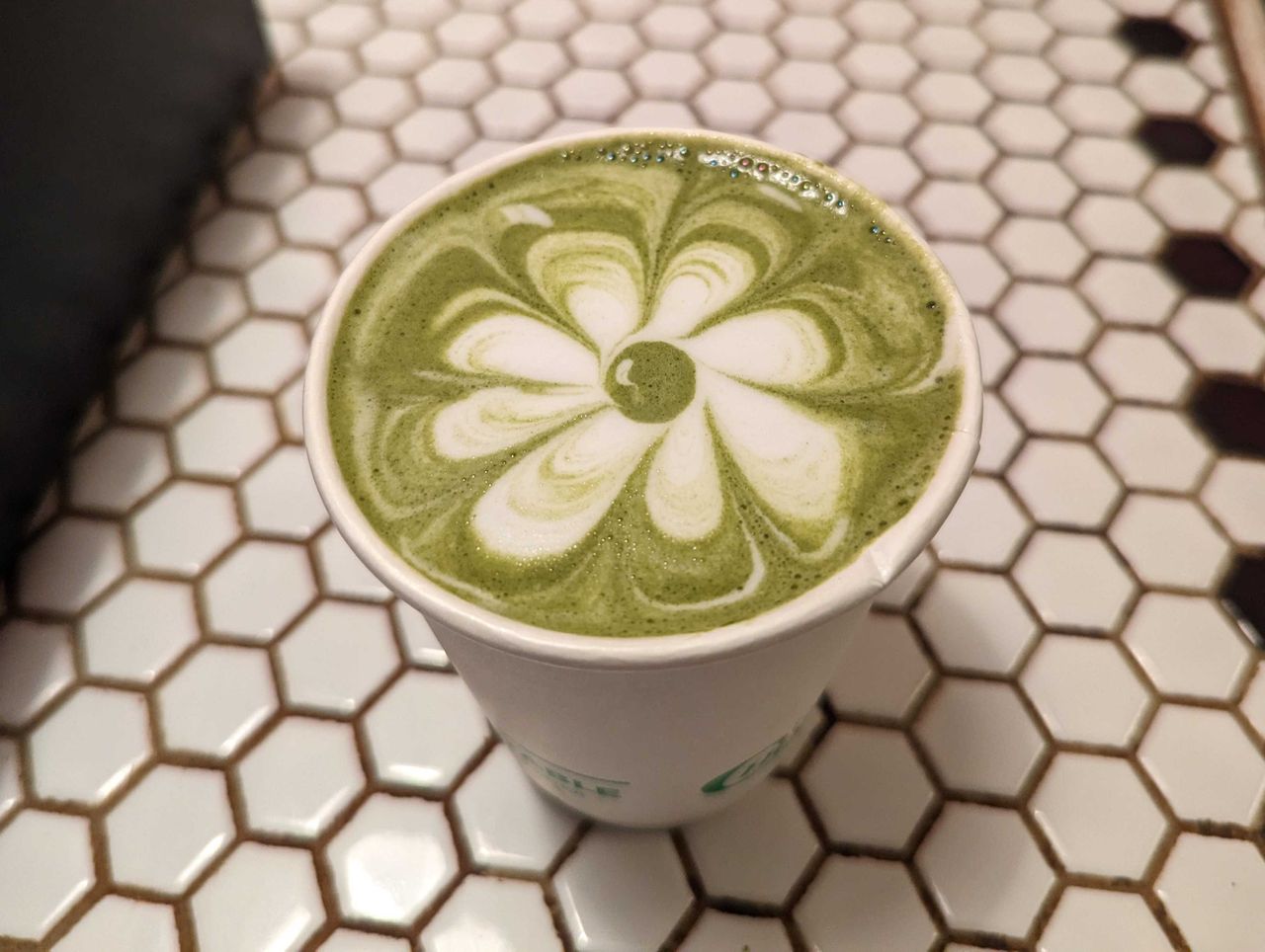 Image of latte art taken by the Pixel 7