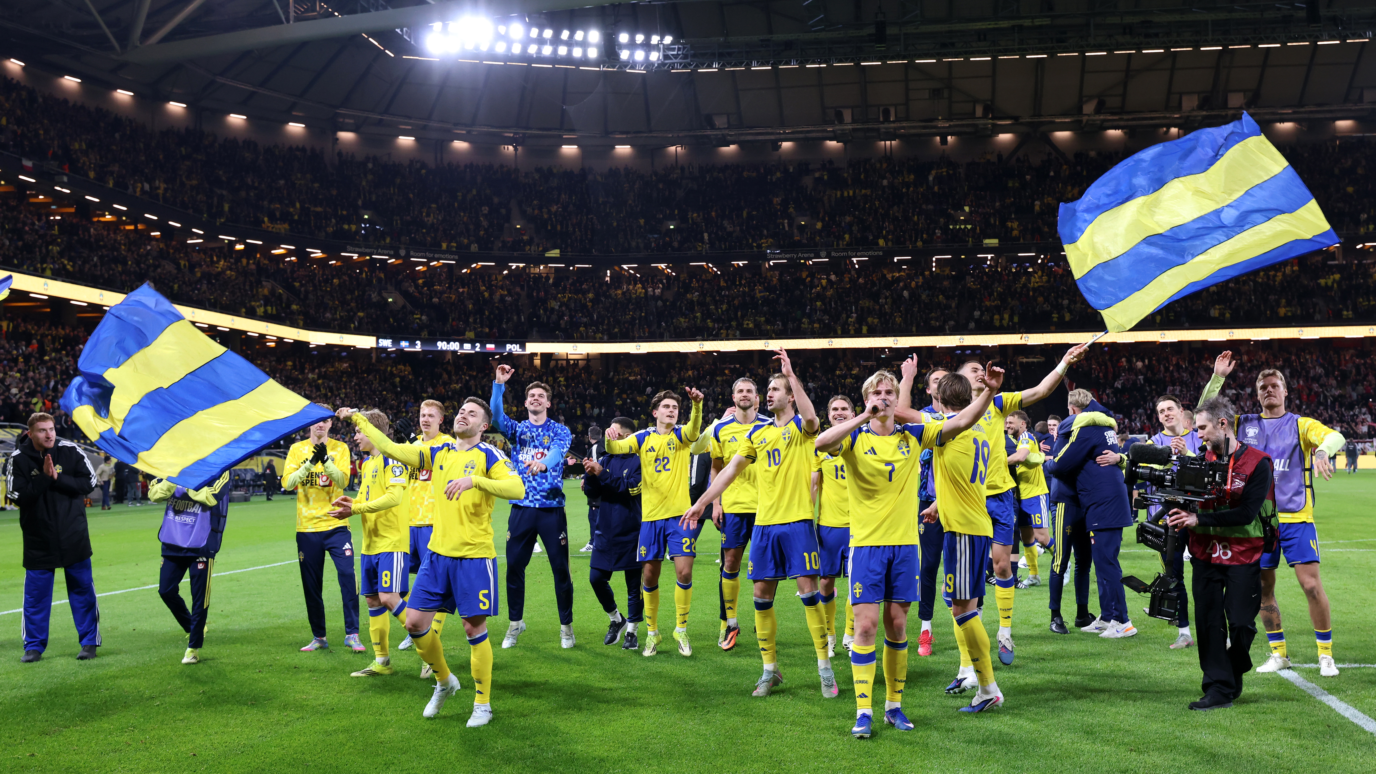 Players of Sweden celebrate their victory following the FIFA World Cup 2026 European Qualifiers KO play-offs match between Sweden and Poland 