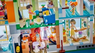 Lego apartments and minifigures going about daily business