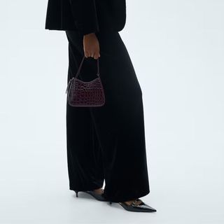 Wide leg velvet trousers from Mango