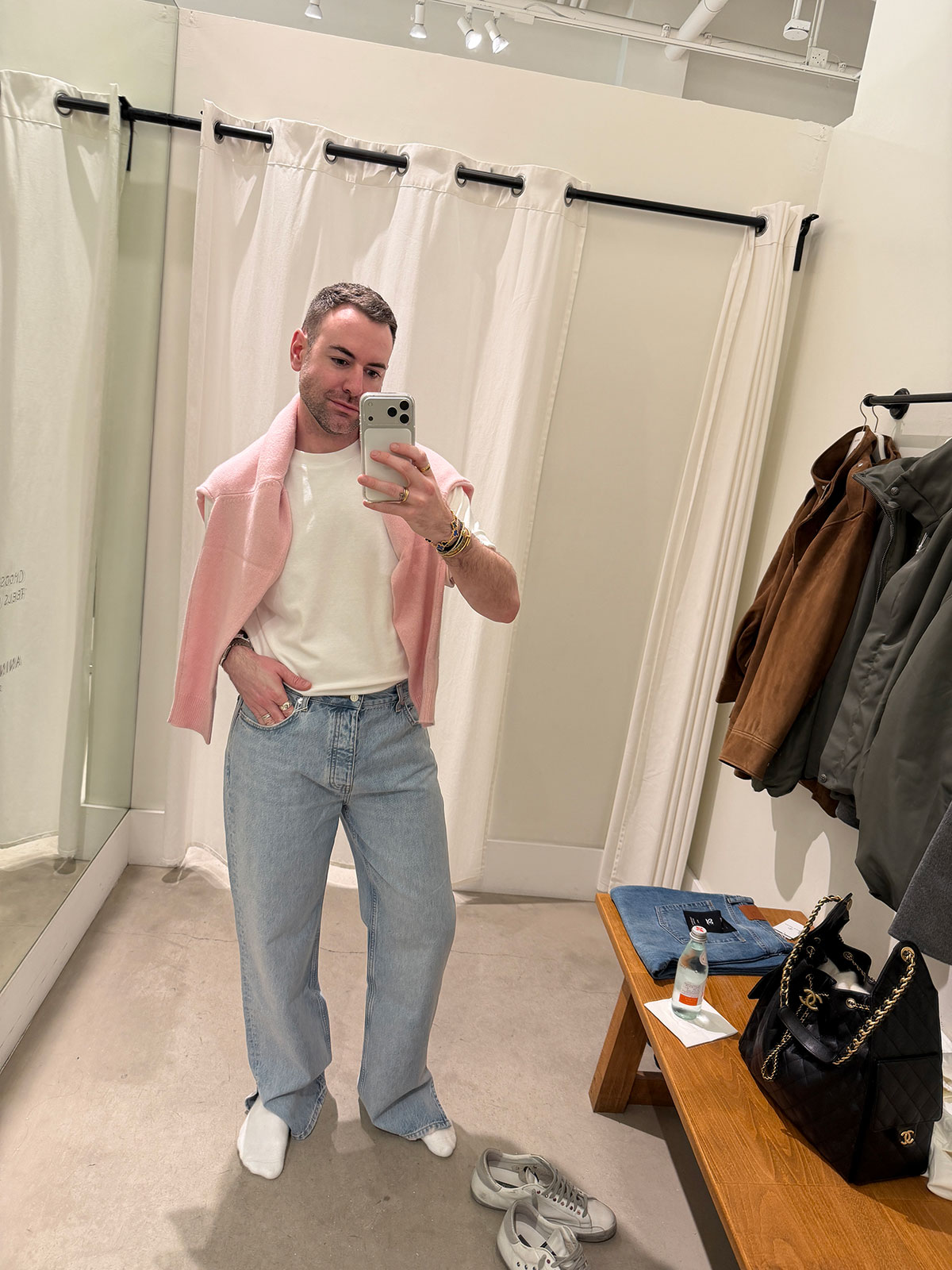 trying on split hem jeans