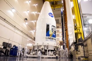 NASA's new Landsat 9 Earth-observation satellite is secured inside its payload fairing for a planned September 2021 launch into orbit on a United Launch Alliance Atlas V rocket from the Vandenberg Space Force Base in California.