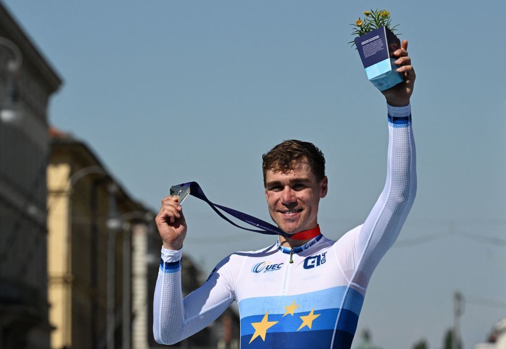 Winner Netherlands Fabio Jakobsen celebrates on the podium with his gold medal after the mens road race cycling event of the European Championships Munich 2022 in Munich southern Germany on August 14 2022 Photo by INA FASSBENDER AFP Photo by INA FASSBENDERAFP via Getty Images