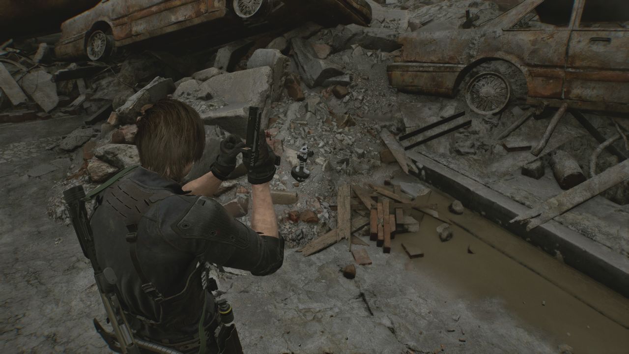 Resident Evil Requiem Mr. Raccoon by some cars