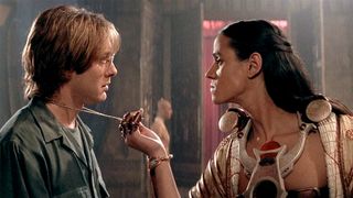James Spader as Dr. Daniel Jackson in Stargate, being confronted by Jaye Davidson as Ra.