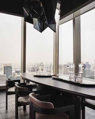 The Wine Vault within Centurion New York, features a custom Lasvit chandelier with sweeping views of Manhattan.