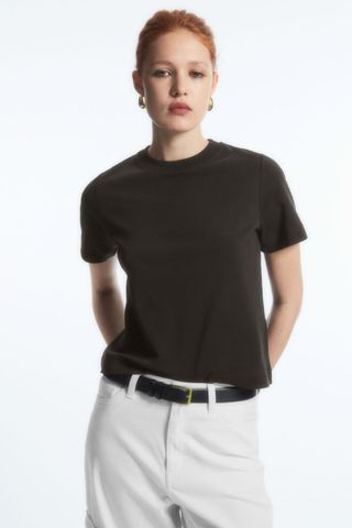 cos sale - woman wearing high neck t-shirt