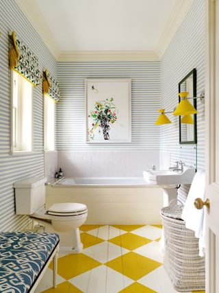 Bathroom with a painted white and yellow chequered wood floor