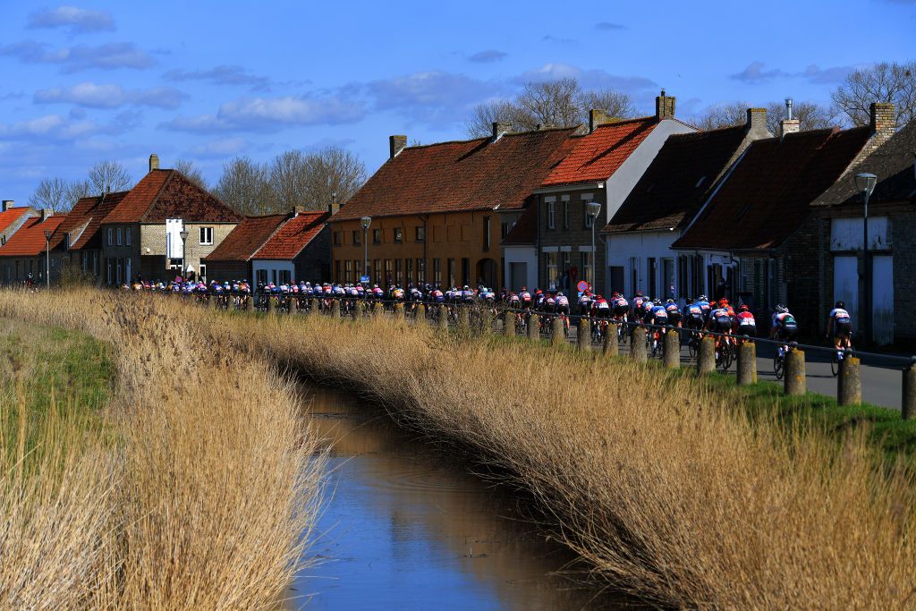 DE PANNE BELGIUM MARCH 25 The peloton during the 4th Oxyclean Brugge De Panne 2021 Women Classic a 1588km race from Brugge to De Panne Landscape OxycleanClassic UCIWWT on March 25 2021 in De Panne Belgium Photo by Luc ClaessenGetty Images
