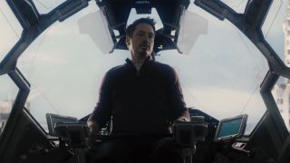 Tony in the pilot seat of a Quinjet in Age of Ultron