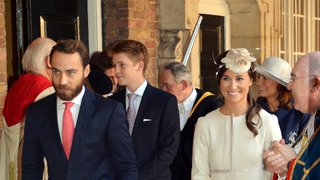 Pippa and James Middleton leave the Chapel Royal in St James's Palace, after the christening of the three month-old Prince George of Cambridge by the Archbishop of Canterbury on October 23, 2013 in London, England