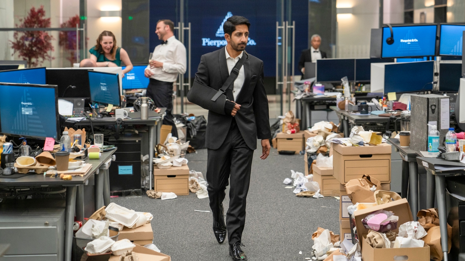 Rishi walks through the offices in Industry season 3