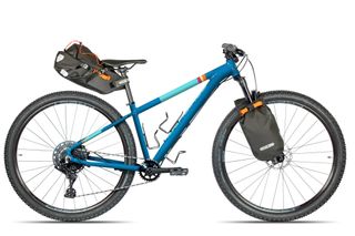The Islabike adult Creig fully accessorised for an off-road bike packing trip
