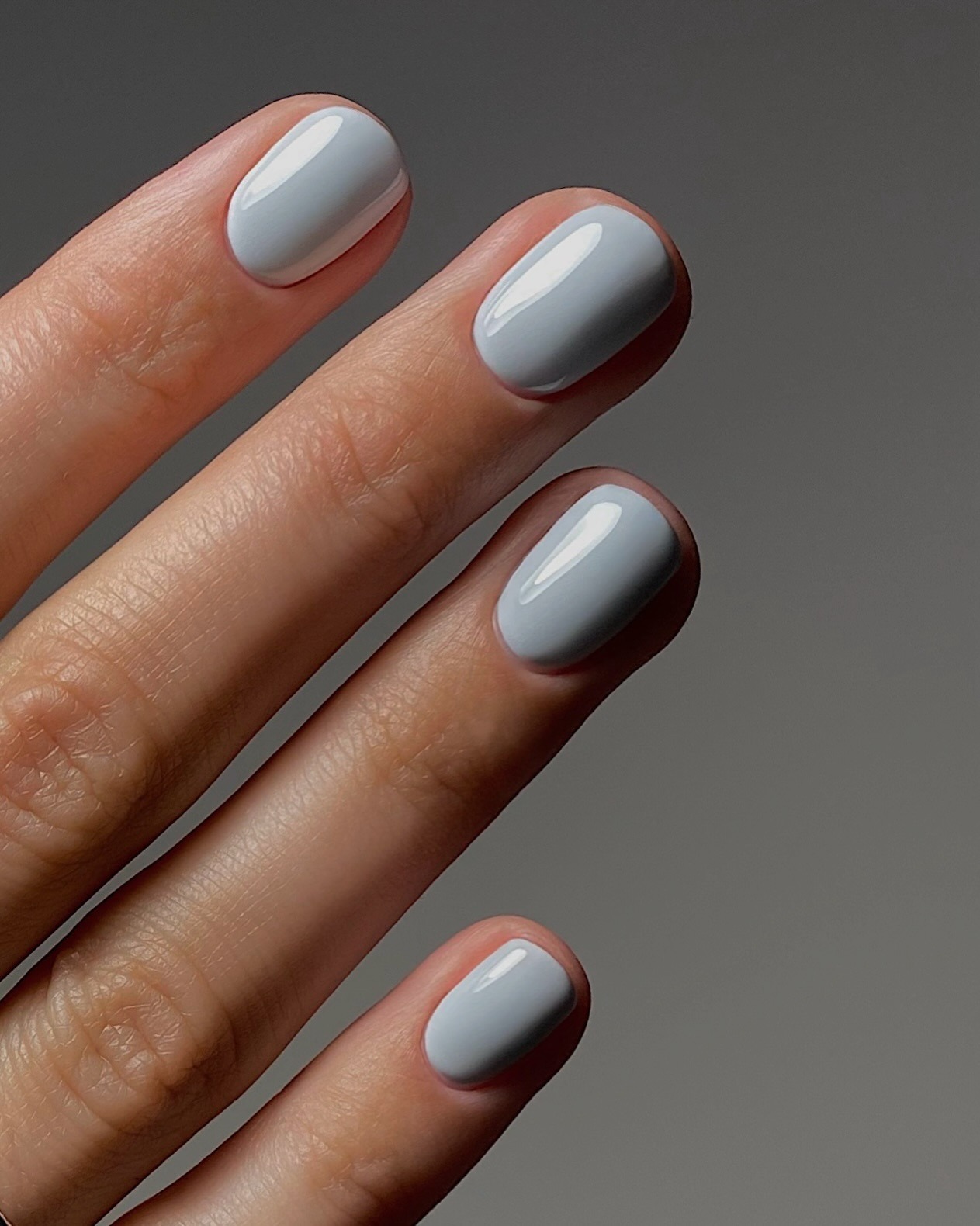 A short pastel blue manicure