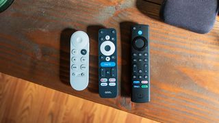 Onn Google TV 4K Pro remote with the Chromecast remote and Fire TV remote