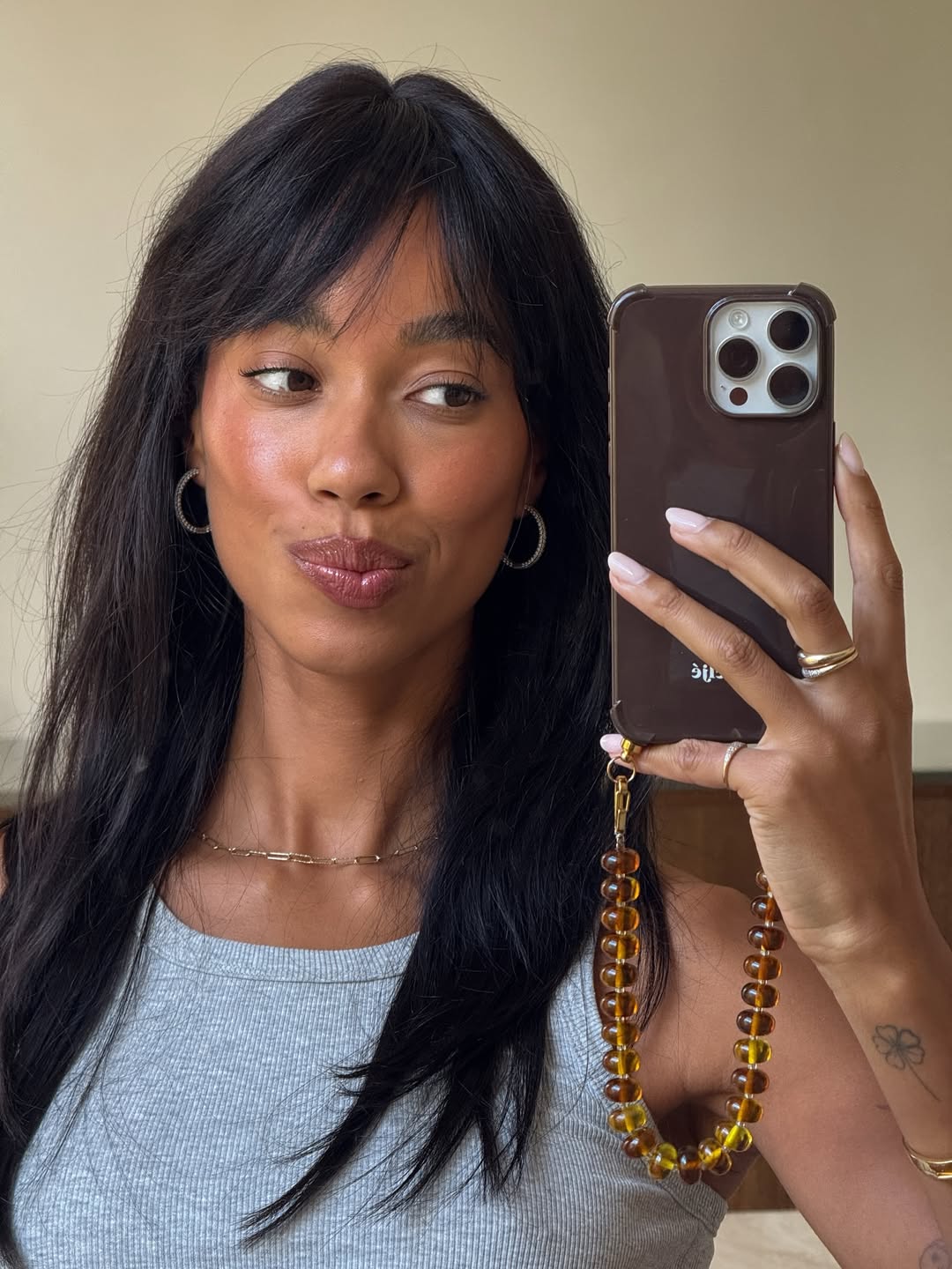 Amaka Hamelijnck wearing a berry-toned lip and matching blush