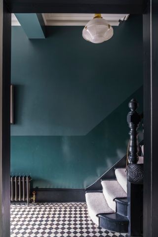 Farrow & Ball gloss paint at half height in a hallway