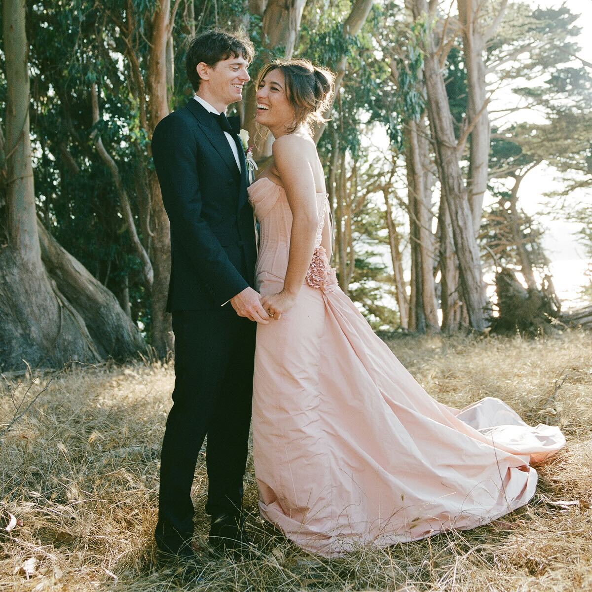 Hadley and Charles walking down the aisle after getting married.