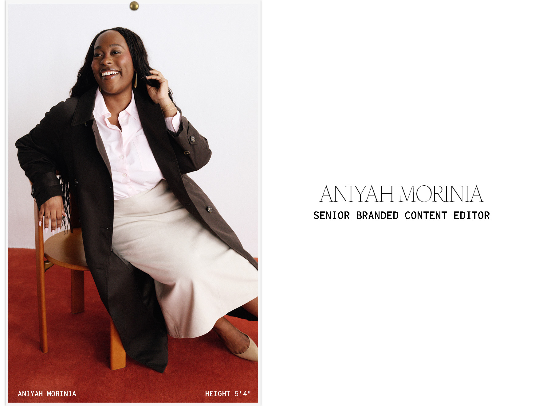 Aniyah wears a brown trench coat, pink top, and beige skirt.