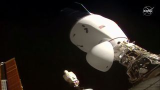 SpaceX's Dragon CRS-21 cargo spacecraft docks with the International Space Station, on Dec. 7, 2020.