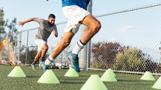 Two men perform sprints as part of pre-season training