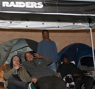 Some other campers under a Raider tent.