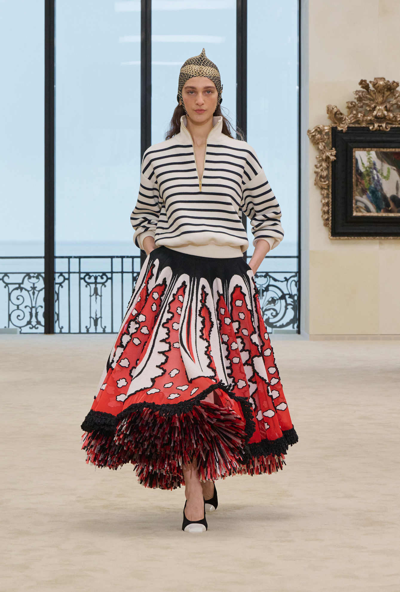 A model wore Dua Lipa's striped sweater on the Chanel Cruise 2027 runway
