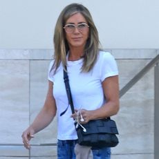 Jennifer Aniston wears a white T-shirt