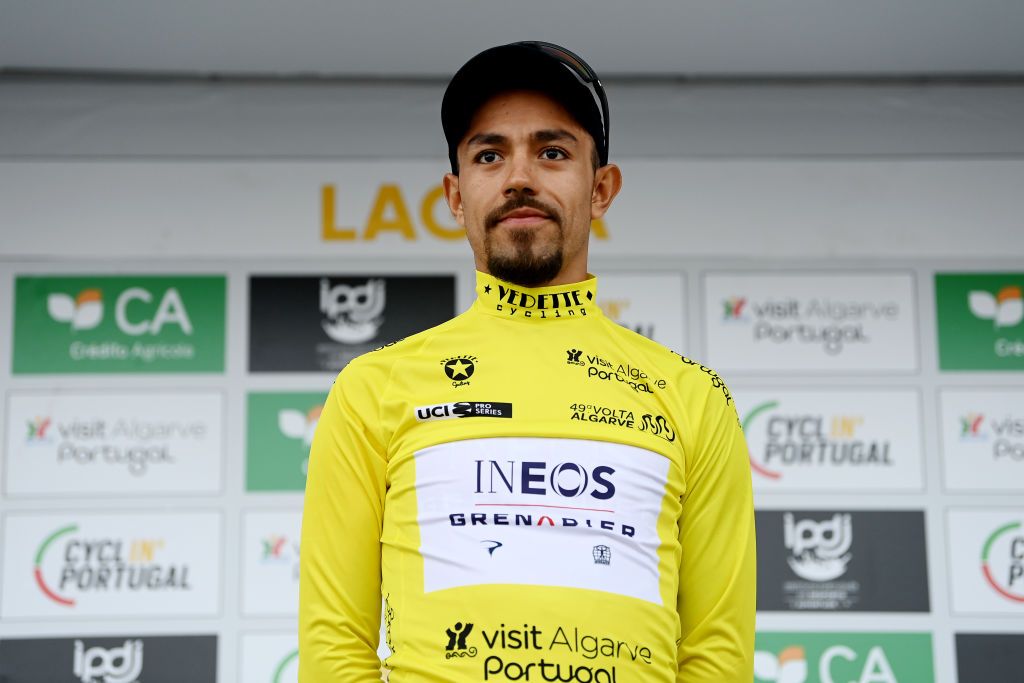 LAGOAPRAIA DO CARVOEIRO ALGARVE PORTUGAL FEBRUARY 19 Daniel Martinez of Colombia and Team INEOS Grenadiers celebrates at podium as Yellow Leader Jersey winner during the 49th Volta ao Algarve em Bicicleta 2023 Stage 5 a 244km individual time trial stage from Lagoa to Lagoa VAlgarve2023 on February 19 2023 in Lagoa Algarve Portugal Photo by Tim de WaeleGetty Images