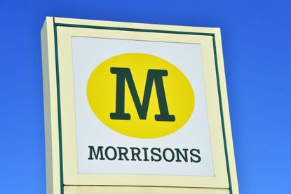A logo of Supermarket company, Morrisons is seen outside one of its stores on November 13, 2020 in Newcastle-Under-Lyme, Staffordshire