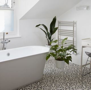 Attic ensuite bathroom with encaustic cement floor tiles