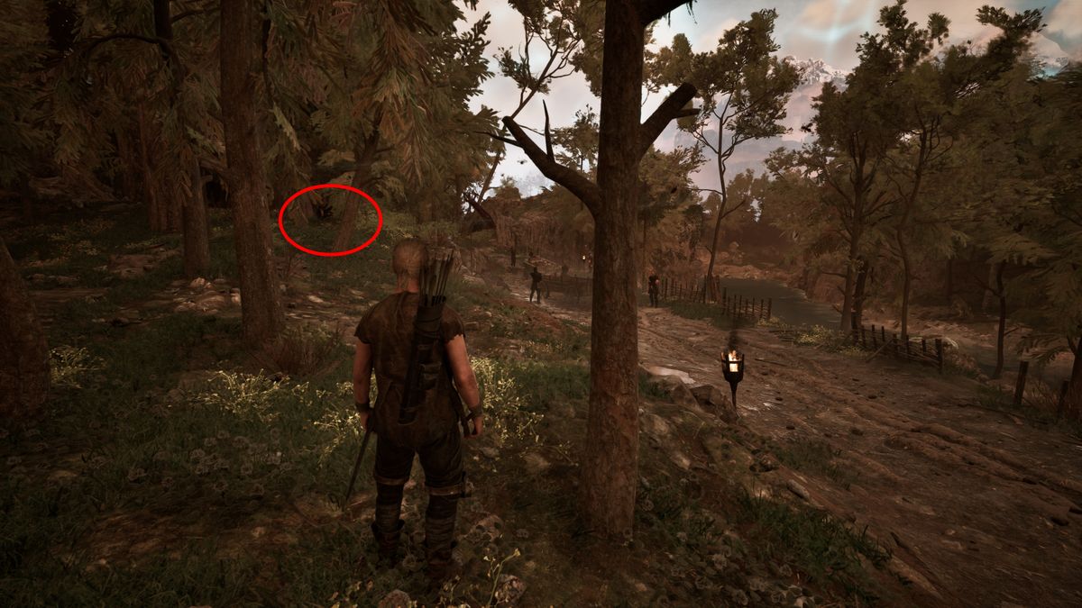 Gothic Remake New Camp: A player looking at a cart of Warders stuck in the road, with a red circle pointing out the bandits hiding in the treeline.
