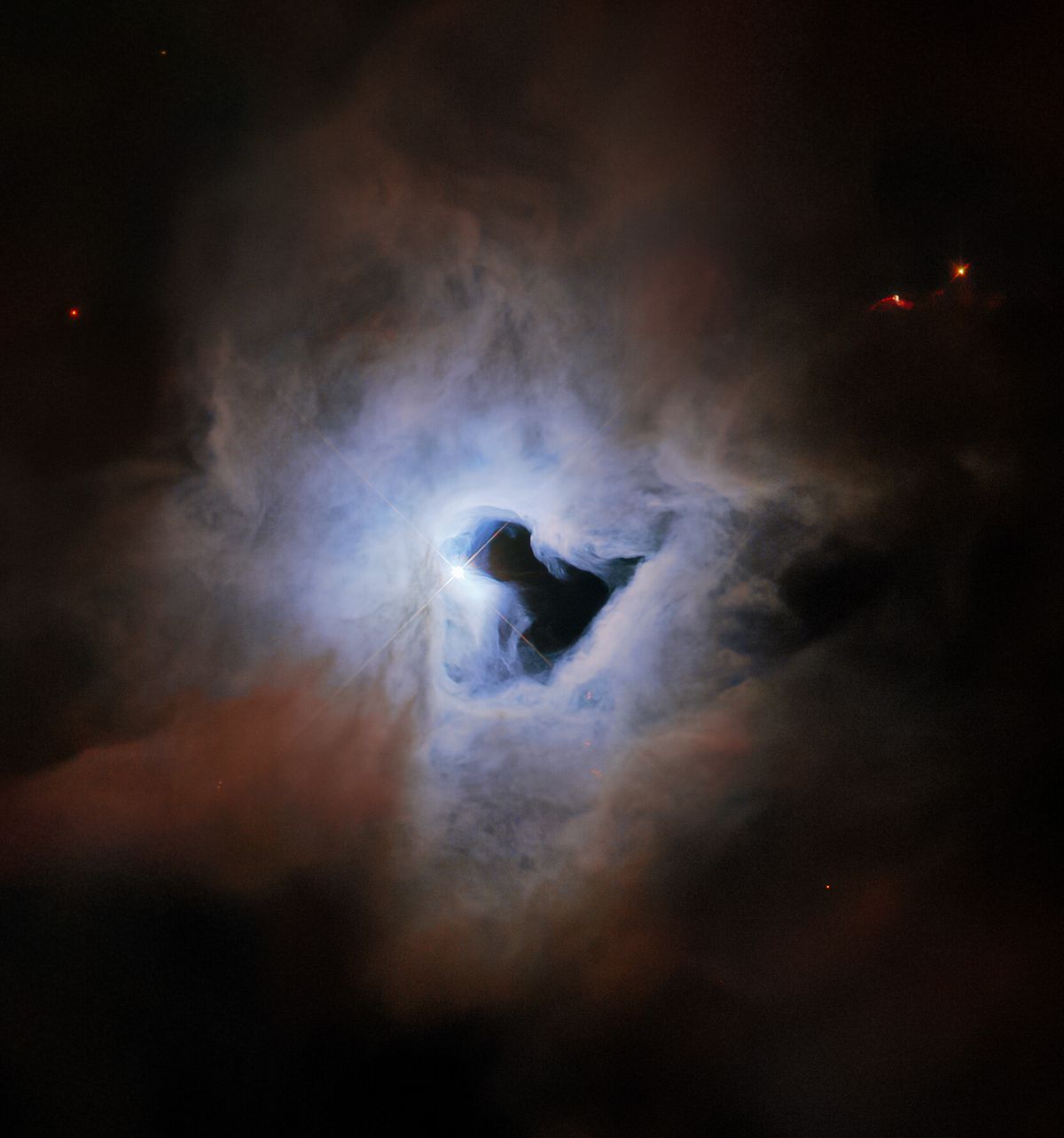 This peculiar portrait from the NASA/ESA Hubble Space Telescope showcases NGC 1999, a reflection nebula in the constellation Orion.  (Image credit: ESA/Hubble & NASA, ESO, K. Noll)