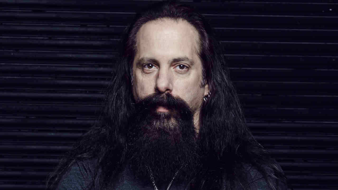 Dream Theater posing for a photograph in 2016