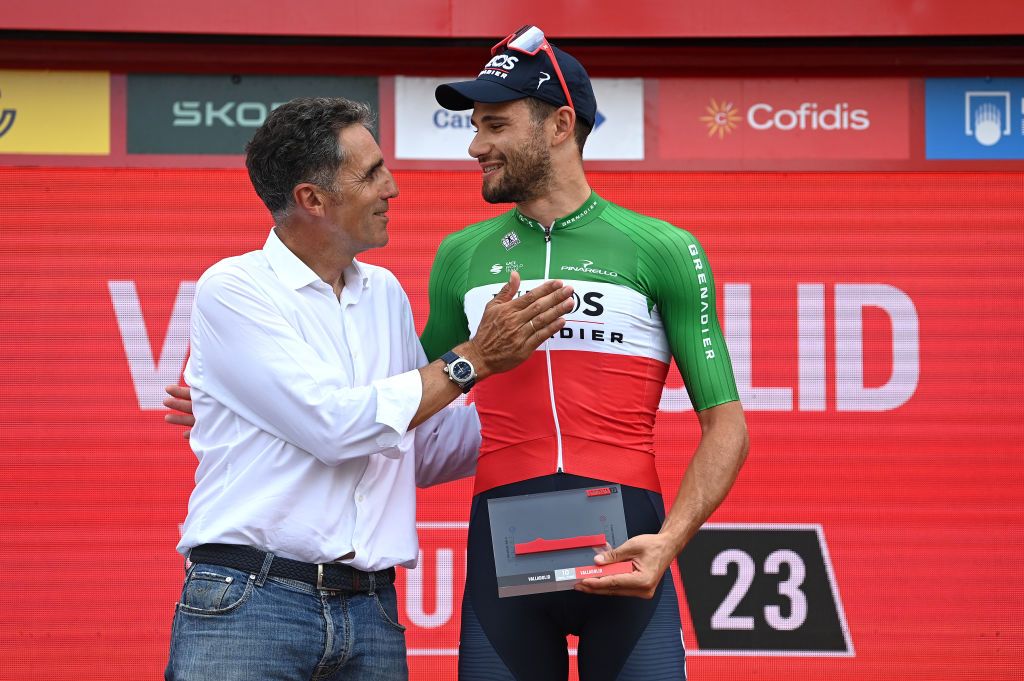 VALLADOLID SPAIN SEPTEMBER 05 LR Miguel Indurain of Spain five times Tour de France winner and stage winner Filippo Ganna of Italy and Team INEOS Grenadiers pose on the podium ceremony after the 78th Tour of Spain 2023 Stage 10 a 258km individual time trial stage from Valladolid to Valladolid UCIWT on September 05 2023 in Valladolid Spain Photo by Tim de WaeleGetty Images