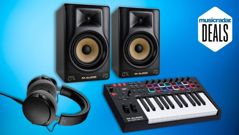 A selection of studio gear including monitors, MIDI keyboard, and studio headphones