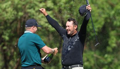 Lawrence gets sprayed with champagne 