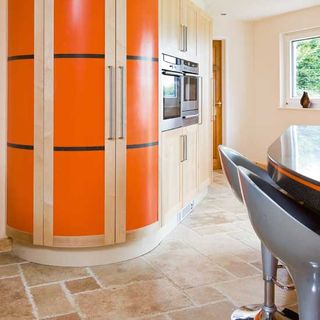 kitchen with orange cabinetry