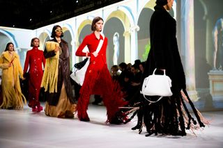 Model at ramp walk in FASHION show Bottega Veneta A/W 2020 Milan Fashion Week Women’s