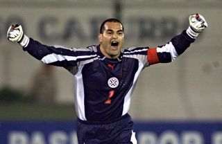Jose Luis Chilavert celebrates a goal for Paraguay against Peru in a World Cup qualifier in November 2000.