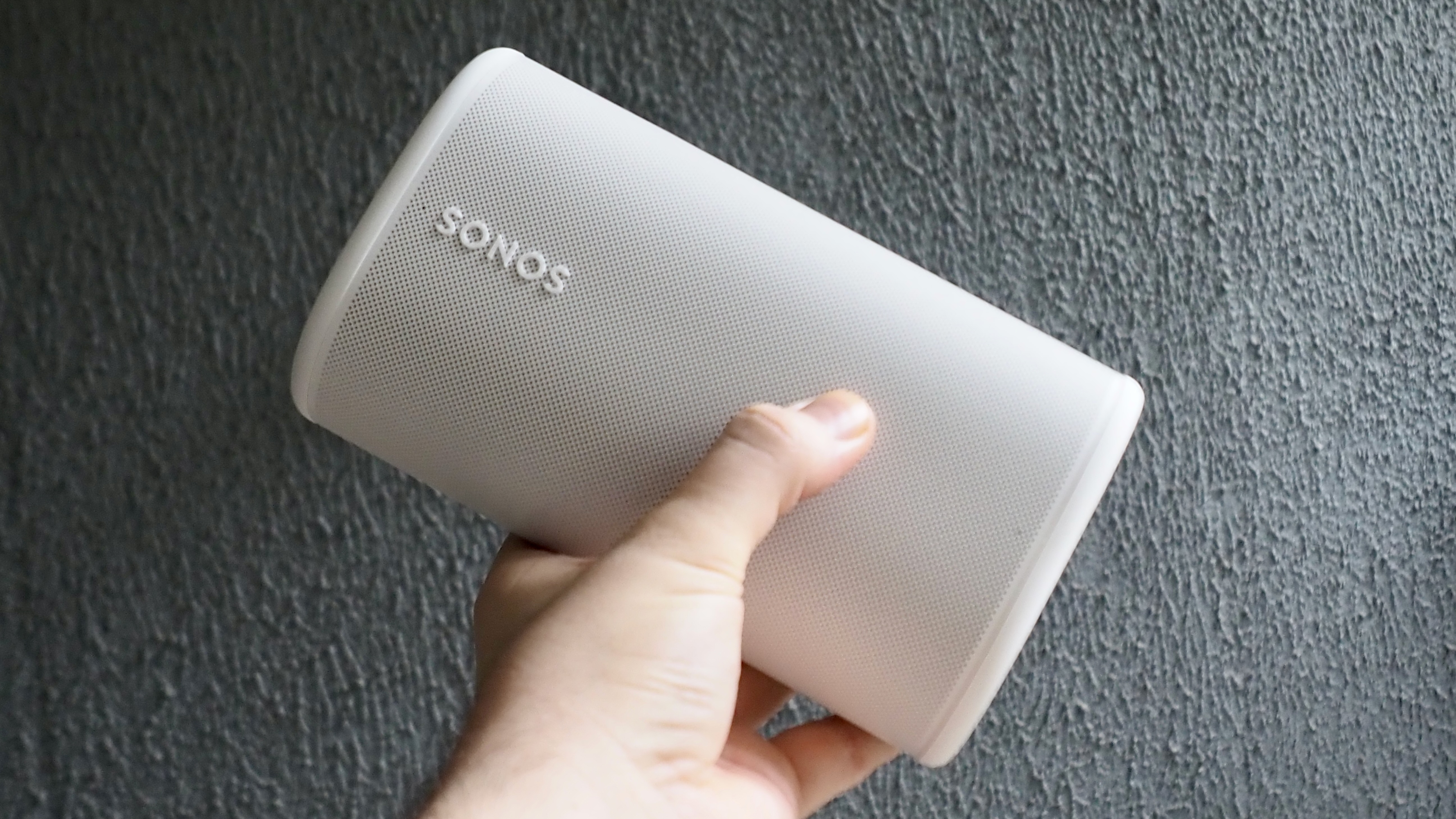 Sonos Play speaker held in a hand