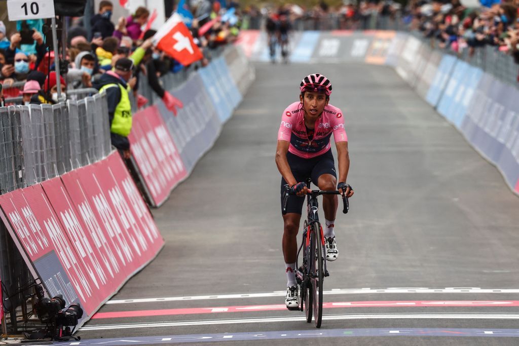 Overall leader Team Ineos rider Colombias Egan Bernal crosses the finish line to place second of the 20th stage of the Giro dItalia 2021 cycling race 164km between Verbania and Valle Spluga Alpe Motta Madesimo on May 29 2021 Photo by Luca Bettini AFP Photo by LUCA BETTINIAFP via Getty Images