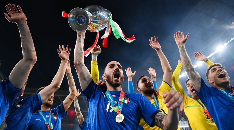 Italy players celebrate with the trophy after winning Euro 2020.