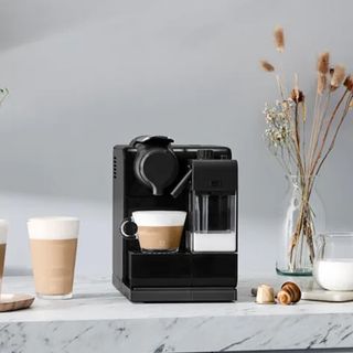 Image of De'Longhi Nespresso machine in press image