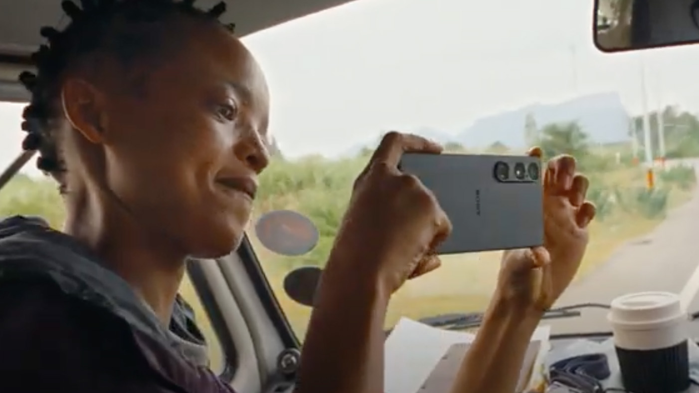 A still shot from the Sony Xperia teaser video showing a person holding a smartphone in two hands