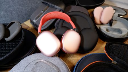 Best AirPods Max cases: AirPods Max cases lede image showing AirPods Max headphones surrounded by cases on test