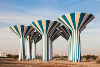 Blue and white water towers in Kuwait.