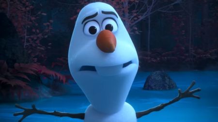 A screenshot of Olaf with his arms stretched out in Frozen 2.