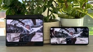 Samsung Galaxy Z Fold 5 and iPhone 14 Pro Max showing Ahsoka trailer